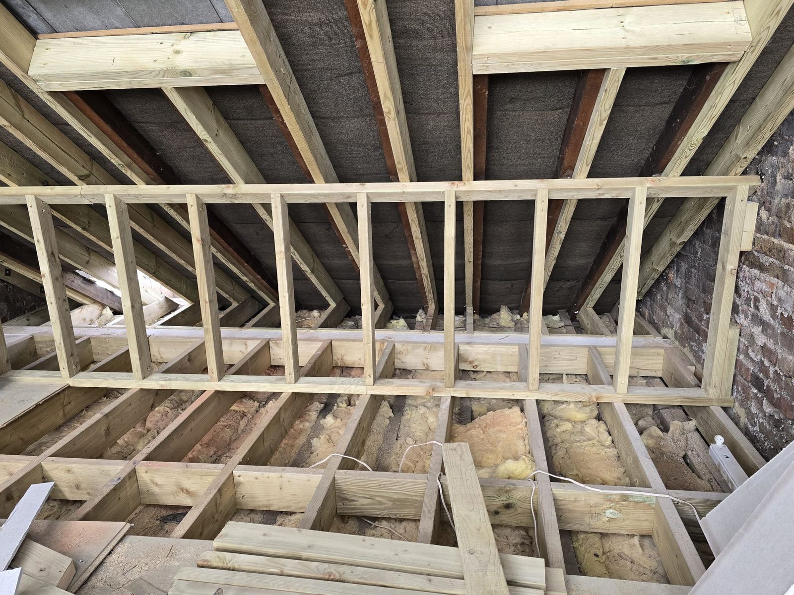 Structural steel and new timber joists during a loft conversion by M Renovations in London