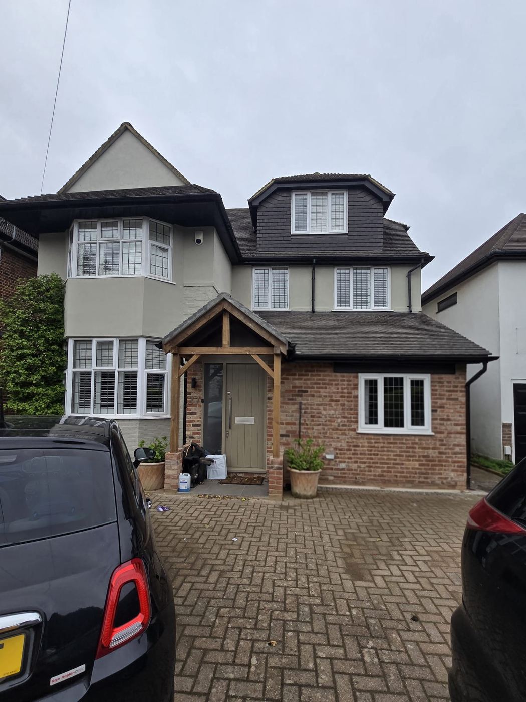 A London house with a completed brick side extension and new porch by M Renovations