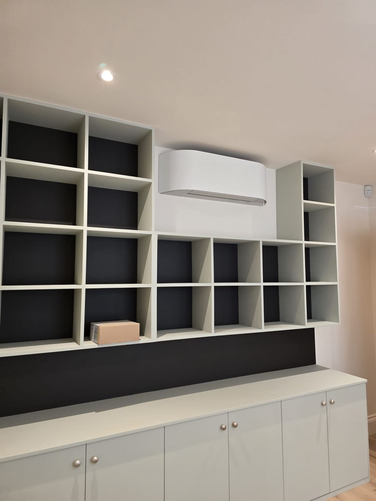 Fitted shelving and storage wall
